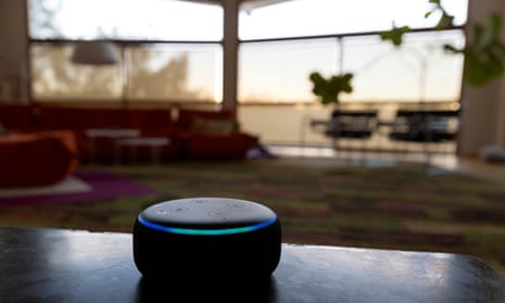 Amazon Echo Dot is seen in a room