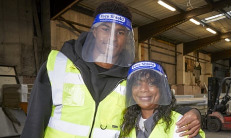 Marcus Rashford and his mother, Melanie, visit FareShare in Greater Manchester on 22 October.