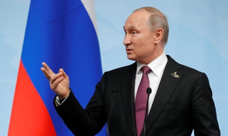 Vladimir Putin speaks during a news conference after the G20 summit.