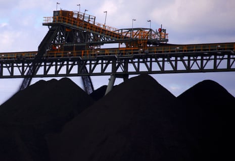 FILE PHOTO: Coal is unloaded onto large piles at the Ulan Coal mines near the central New South Wales rural town of Mudgee in Australia, March 8, 2018. Picture taken March 8, 2018. REUTERS/David Gray/File Photo