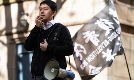 Former Hong Kong politician Ted Hui speaks at a rally in Sydney, Australia