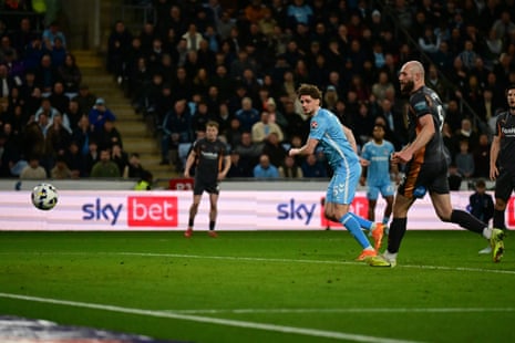 Coventry’s Jack Rudoni watches as his shot heads towards the back of the Derby net and put the home ahead again.