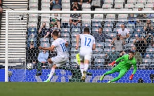 The keeper dives the wrong way for the penalty.