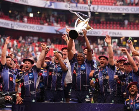 Bordeaux-Bèglesâ Matthieu Jalibert lifts the Champions Cup trophy after their victory over Leinster in May