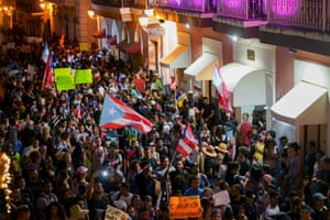 Thousands fill Calle Fortaleza outside the governor’s mansion chanting songs asking for his resignation following a massive anti governor Ricky Rosselló rally in front of the Capitol building.
