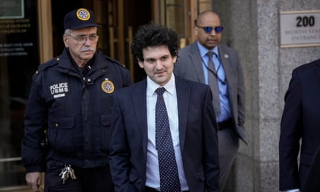 Sam Bankman-Fried leaves court in Manhattan on Thursday after his arraignment hearing.