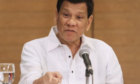Philippine President Rodrigo Duterte gestures as he speaks during a press conference in Davao City, in the southern island of Mindanao on February 9, 2018. Duterte on February 9, declared himself beyond the jurisdiction of an International Criminal Court probe into thousands of deaths in his “drugs war”, claiming local laws do not specifically ban extrajudicial killings. / AFP PHOTO / --/AFP/Getty Images
