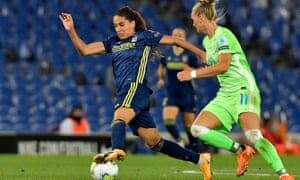 Lyon’s Amel Majri being chased by Wolfsburg’s Alexandra Popp during the Champions League final.