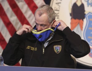 New Jersey governor Phil Murphy removes his mask before giving his daily press briefing in Trenton last weekend.