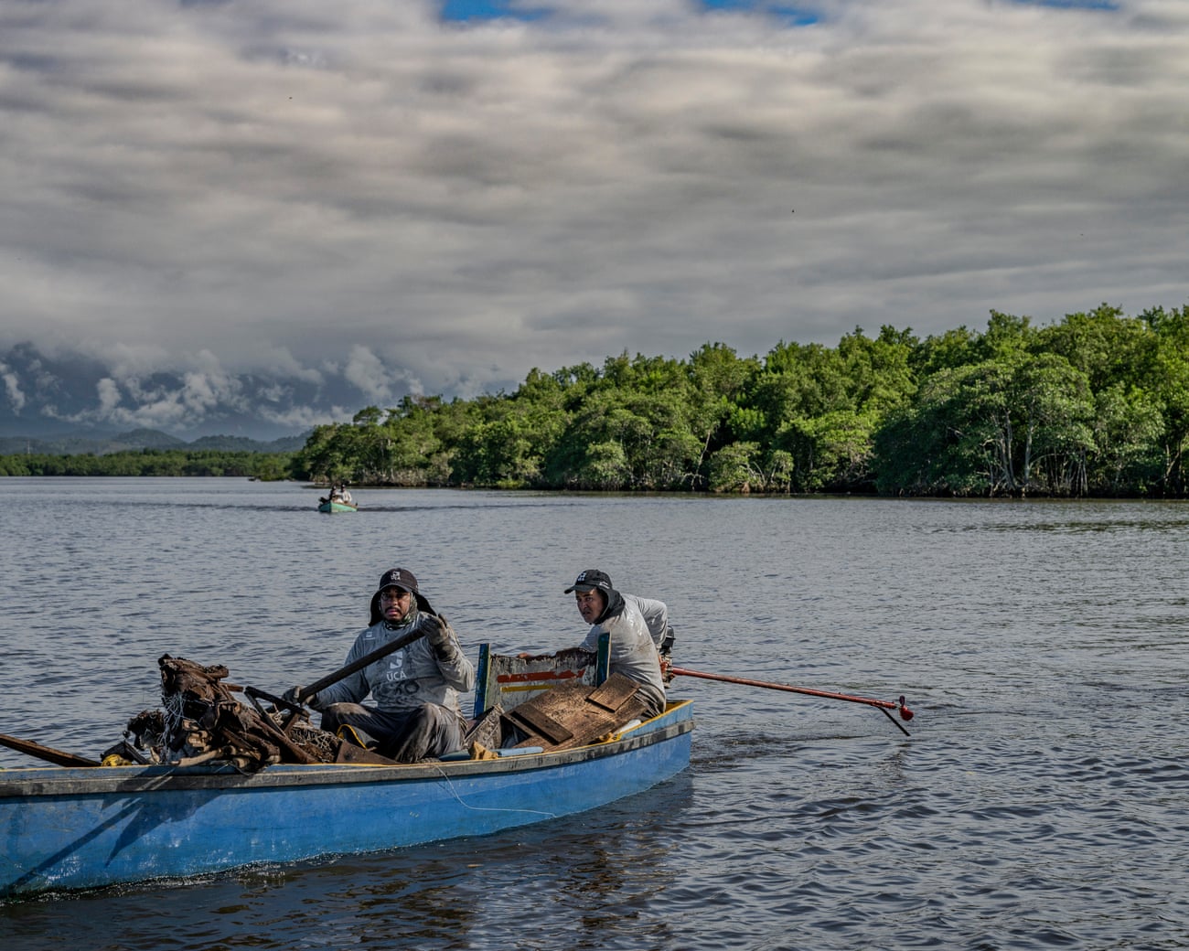 Image Source - https://www.theguardian.com/global-development/2026/feb/05/pollution-brazil-fishers-mangroves-reviving-rio-de-janeiro-famous-bay