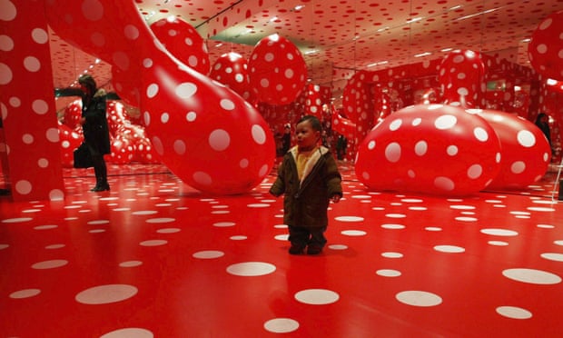 Visitors at Kusama’s Kusamatrix exhibition in Tokyo, 2004.