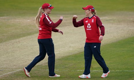 England’s Heather Knight (right) and Sarah Glenn celebrate after their victory.