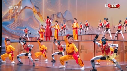 Robots dance with children in China
