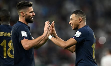 Giroud with Kylian Mbappé.