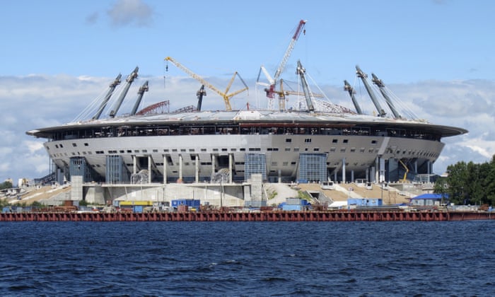 https://www.theguardian.com/football/2017/jun/04/like-prisoners-of-war-north-korean-labour-russia-world-cup-st-petersburg-stadium-zenit-arena#img-2