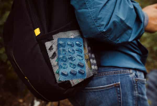 Backpacker with tablets and medication