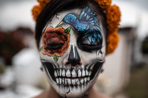 A closeup of a woman’s makeup during the festival of Santa Muerte, a folk saint who personifies death in the form a skeleton, in Coatepec