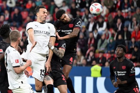 Haris Tabakovic (second left) scores Borussia Mönchengladbach’s equaliser at Bayer Leverkusen.