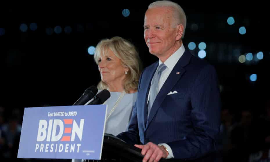 Democratic US presidential candidate and former vice-president Joe Biden speaks with his wife Jill at his side.