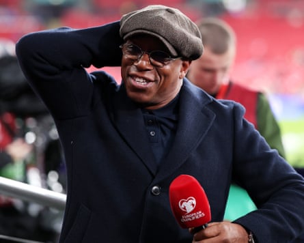 Ian Wright with a microphone