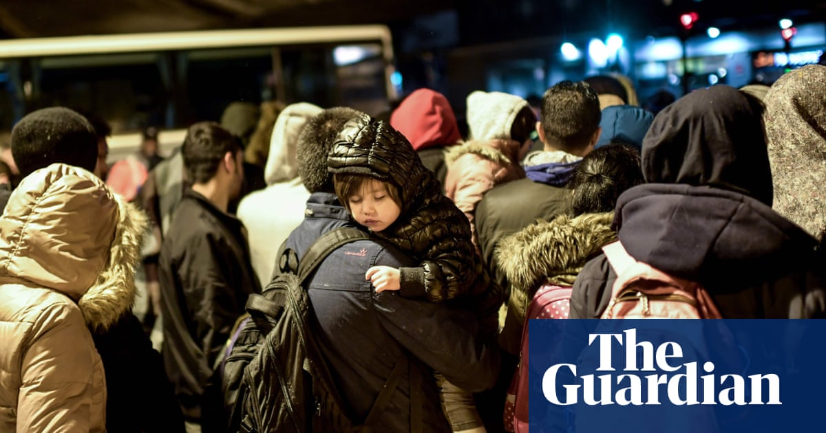Hundreds of migrants removed from makeshift camps in Paris – video