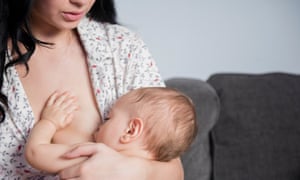 A woman breastfeeding a baby. 5121.jpg?width=300&quality=85&auto=forma