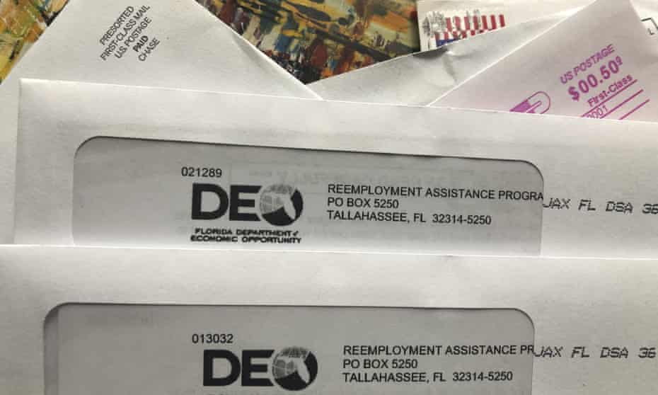 Envelopes from the Florida department of economic opportunity reemployment assistance program are shown, in Surfside, Florida, last year.