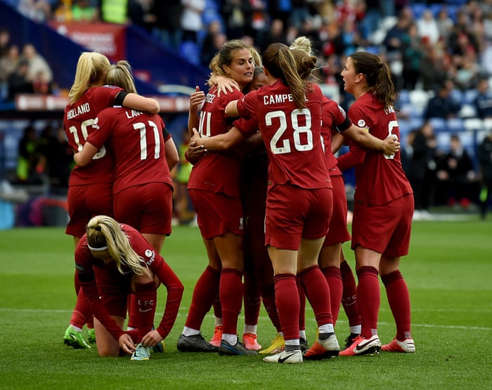 Stengel is under attack by her Liverpool teammates.