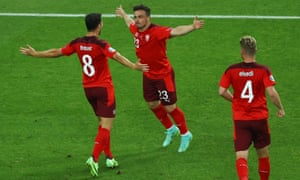 Xherdan Shaqiri (C) of Switzerland celebrates with team-mates after scoring.