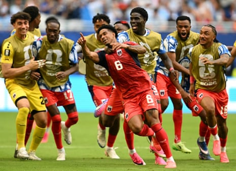 Cape Verde's midfielder Kevin Pina celebrates with teammates after scoring his team's first goal during the 2026 World Cup Group H football match between Uruguay and Cape Verde at the Miami Stadium in Miami Gardens on June 21, 2026