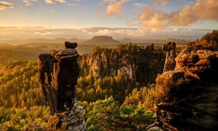 The rocky outcrop called Bastei is a tourist magnet in Saxon Switzerland, with mountain and river views