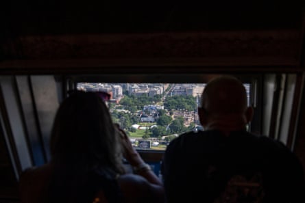 two people look out at an arena