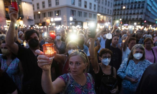 People attend a candlelit vigil in Vienna in memory of doctor Lisa-Maria Kellermayr