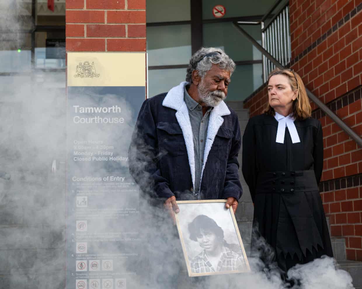 Don Craigie stands alongside NSW deputy state coroner Harriet Grahame at a smoking ceremony outside Tamworth courthouse on Thursday.