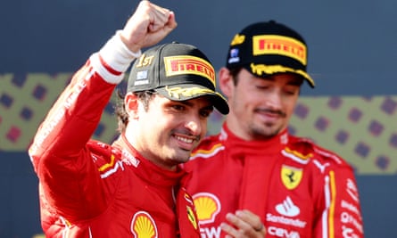 Carlos Sainz of Ferrari celebrates on the podium after winning the Australian F1 Grand Prix ahead of teammate Charles Leclerc in Melbourne.