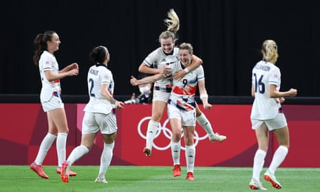 Ellen White (centre) celebrates with Lauren Hemp after her winning goal.