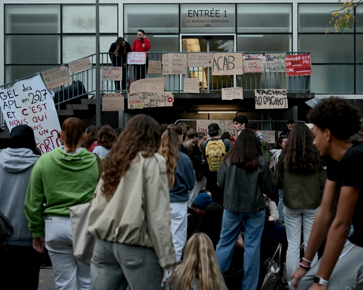 Students protesters hold placards as they gather for a blockade at the IUT Bordeaux Montaigne university institute of technology in Bordeaux.