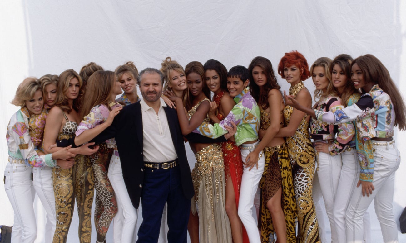 Gianni Versace and models