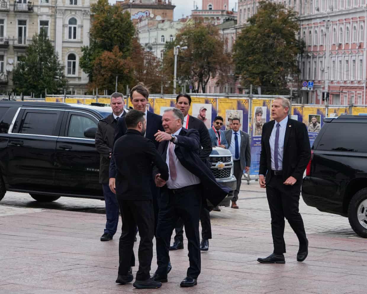 Steve Witkoff goes to embrace Volodymyr Zelenskyy as security personnel look on