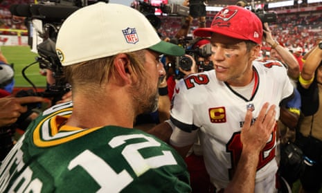 Tom Brady and Aaron Rodgers greet each other after the Green Bay Packers beat the Tampa Bay Buccaneers on Sunday