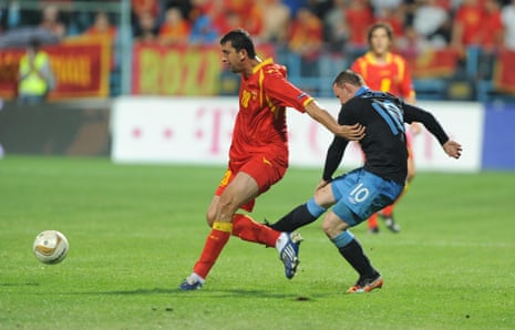 Wayne Rooney kicks a Montenegro player in qualifying in 2011.