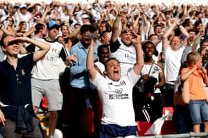 The Fulham fans celebrate Tom Cairney of Fulham’s goal
