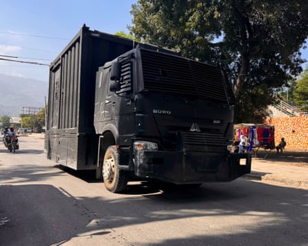 A bulky black vehicle