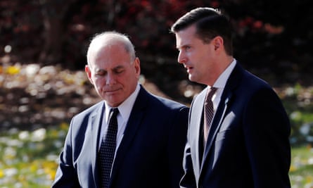 John Kelly walks with the then White House staff secretary Rob Porter in November 2017. Kelly allegedly knew of the domestic violence allegations against Porter last autumn.