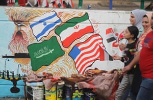 The four flags of the countries regarded as fighting a proxy war inside Iraq – Iran, Saudi Arabia, Israel and the US – superimposed on the image of a monster.