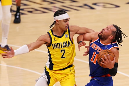 Knicks point guard Jalen Brunson, right, is defended by the Pacers’ Andrew Nembhard during Game 6.