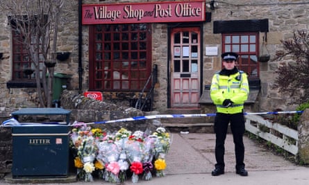 A police officer at the Melsonby post office after Diana Garbutt’s death.