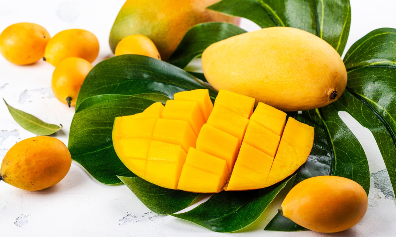 Mangoes diced and on a mango leaf