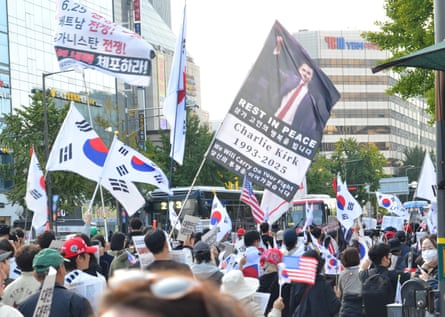 A flag remembering US rightwing activist Charlie Kirk displayed during an anti-China rally in Seoul.