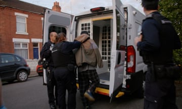 Images from the Home Office showing someone being detained ahead of deportation.